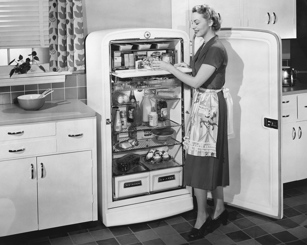 vintage photo of woman at refrigerator